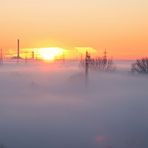 Sole e nebbia all'alba