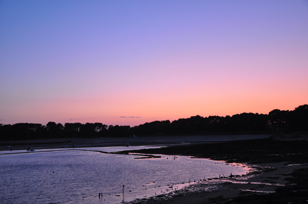 soleil couchant sur la mer descendante