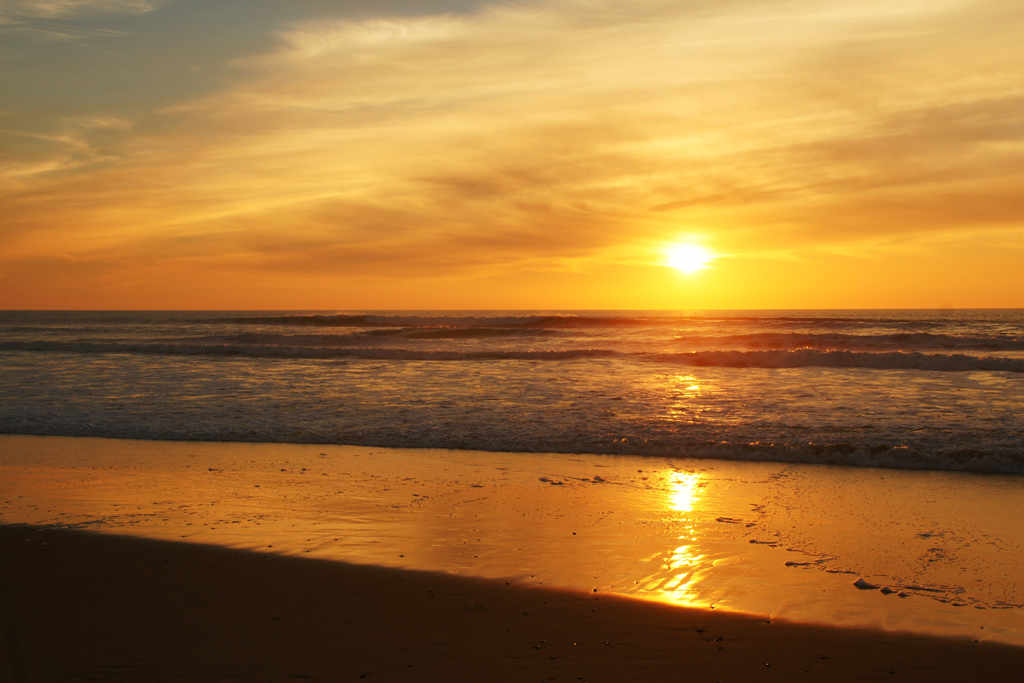 Soleil ouaté, mer calme