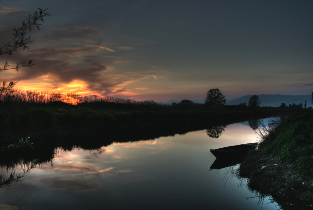 Solitary boat at dusk