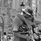 Some days ago at the Ramblas, ...and the two passions in his arms.