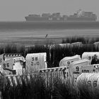 Some days ago in Cuxhaven, containership behind the wadden sea.