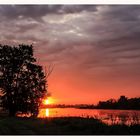 Sommersonne gegen Wolken