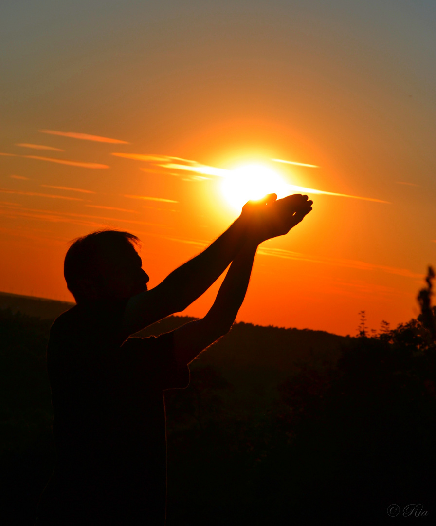 Sonne auf Händen tragen