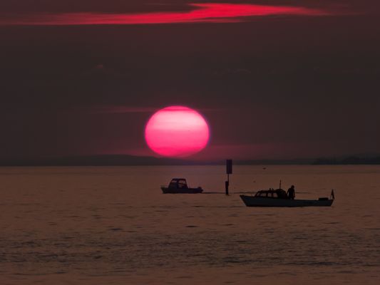 Sonne geht unter am Bodensee