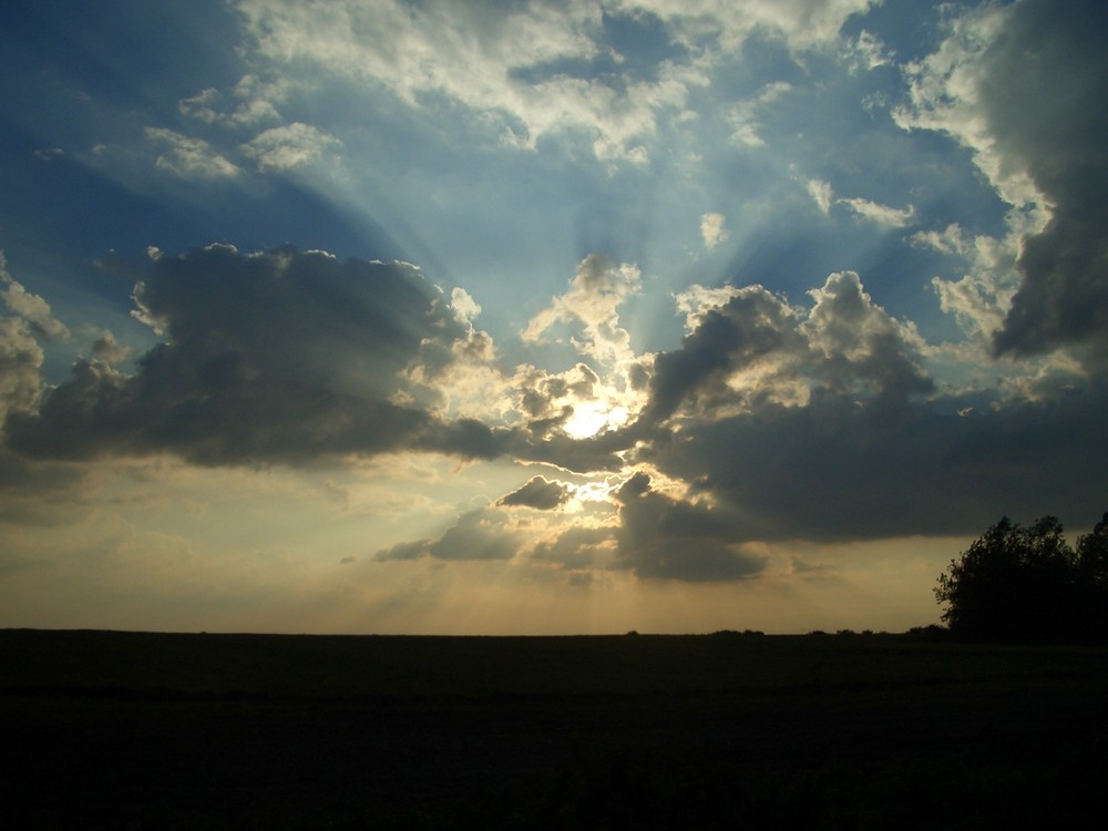 Sonne hinter Wolke