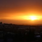 Sonne kurz vor dem Untergang in der Gaswolke von der Holuhraunspalte