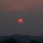 Sonne mit Gürtel