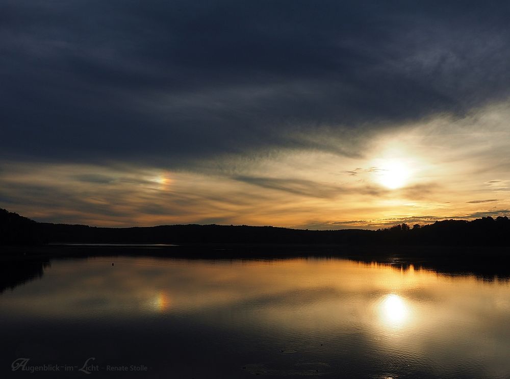 Sonne mit Nebensonne (Halo) ...