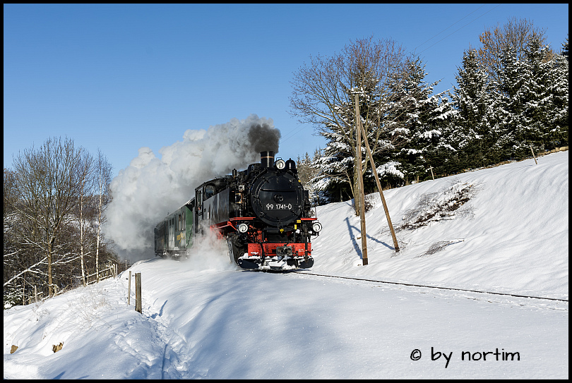 Sonne, Schnee und Dampf