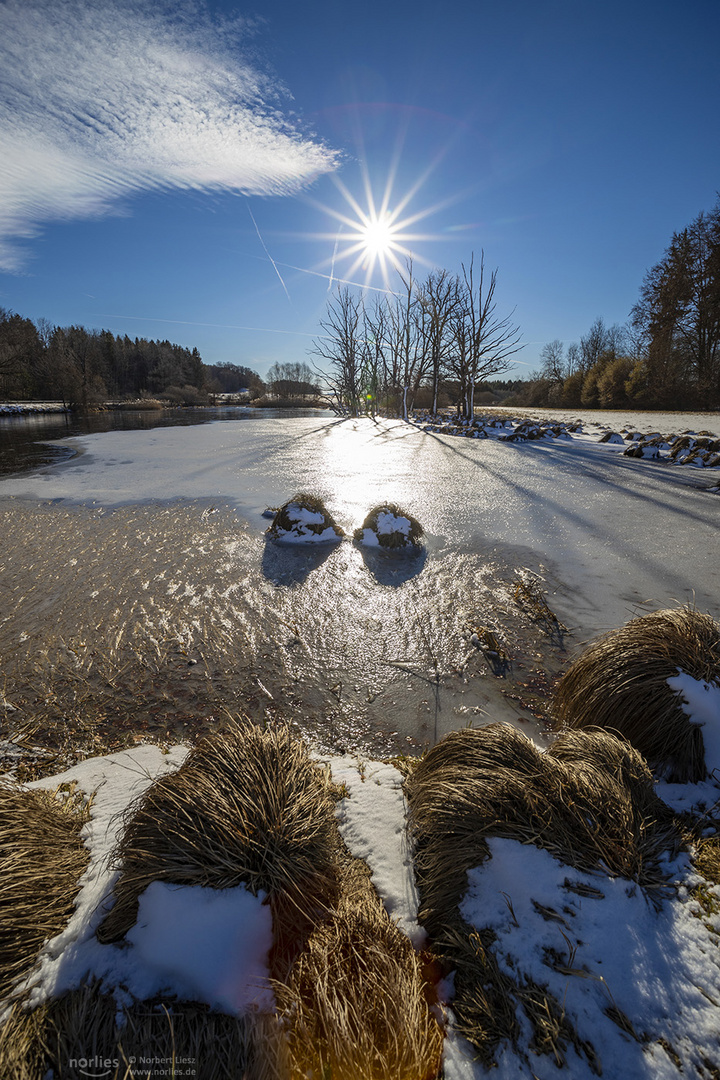 Sonne über dem See