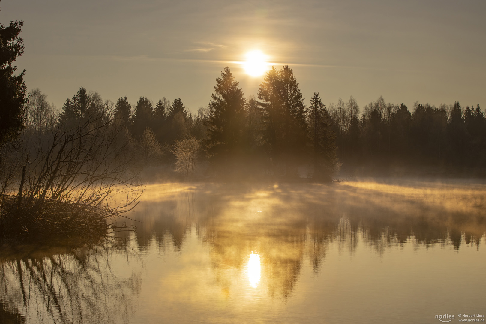 Sonne über dem See