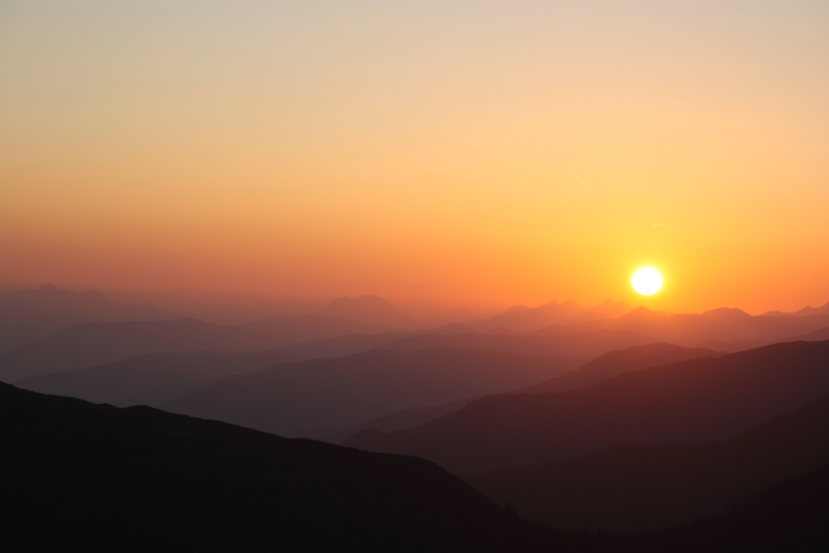 Sonne über den Alpen