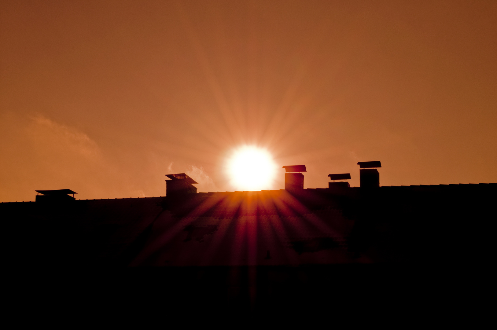 " Sonne über den Dächern"