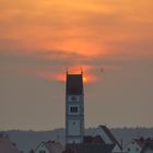 Sonne über der Kirche