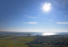 Sonne über Land und Meer