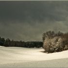 Sonne und Schneewolken