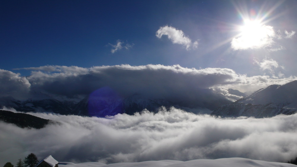 Sonne und Wolken