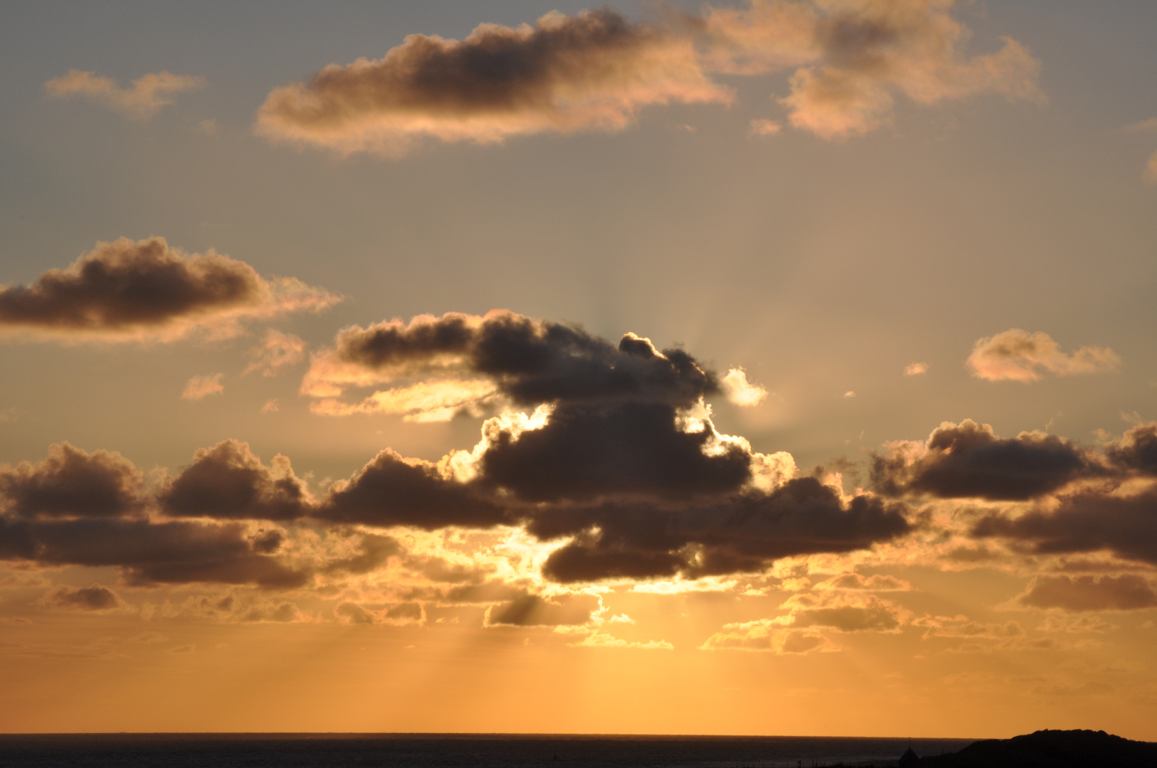 Sonne und Wolken