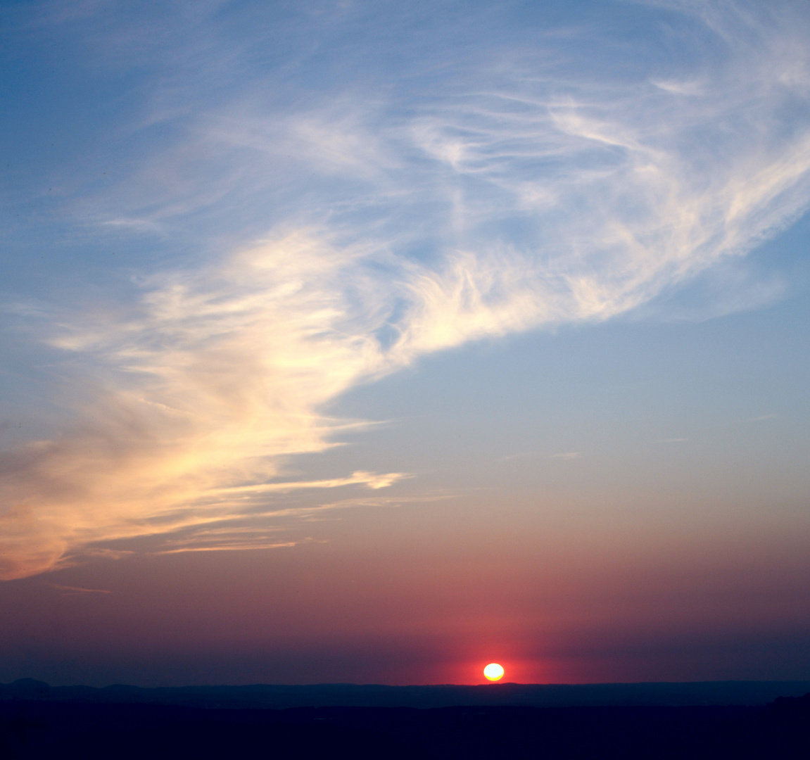 Sonne und Wolken