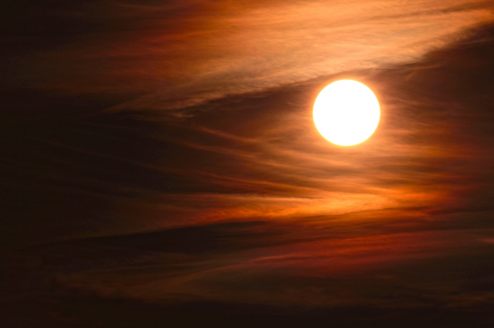 Sonne und Wolken