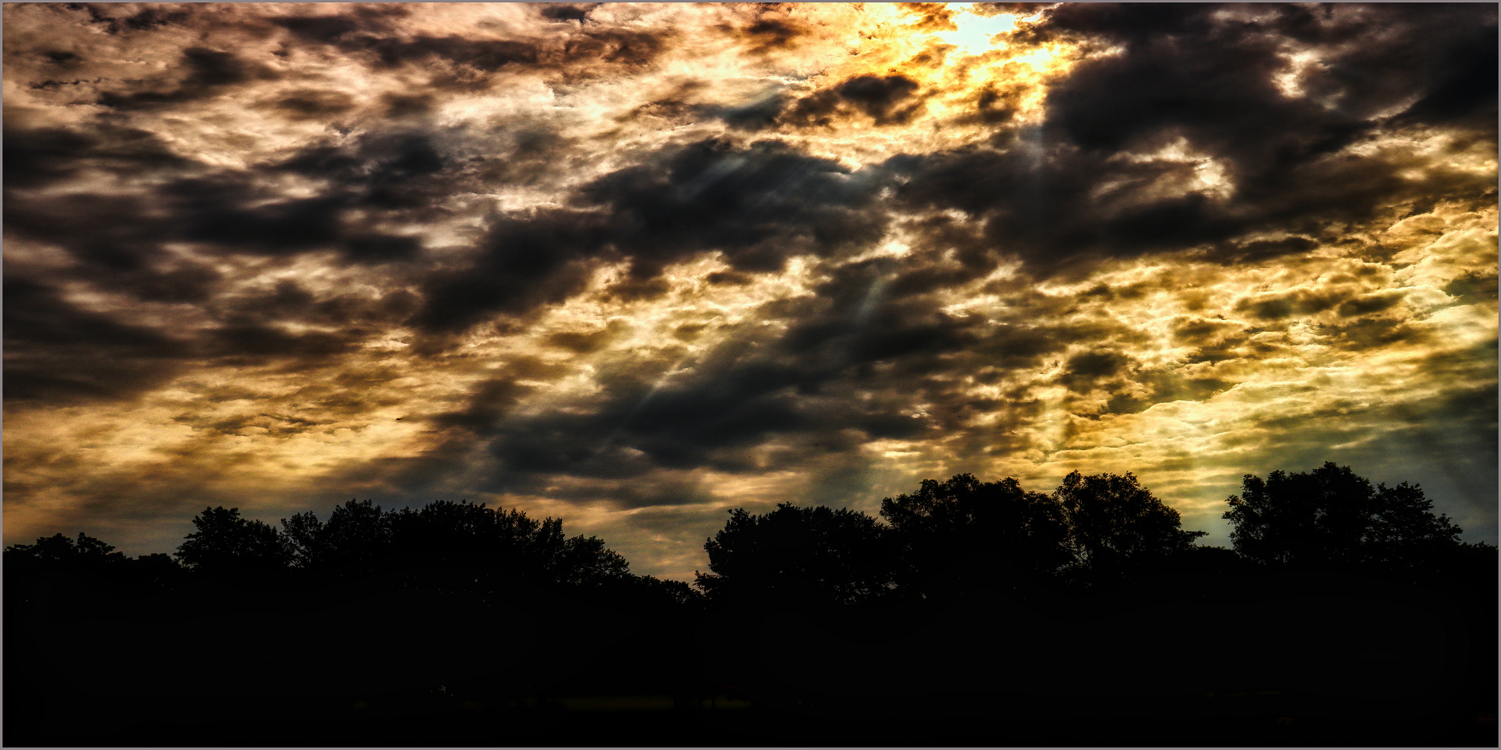 Sonne und Wolken