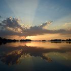 Sonne und Wolken im Spiegel des See's