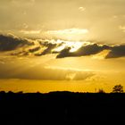 Sonne und Wolken im Zusammenspiel 