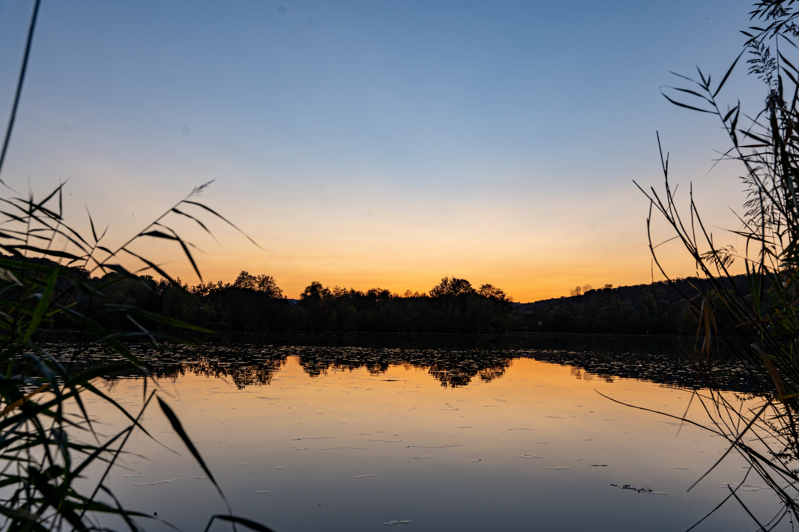 Sonne Untergangsstimmung am Aileswasensee