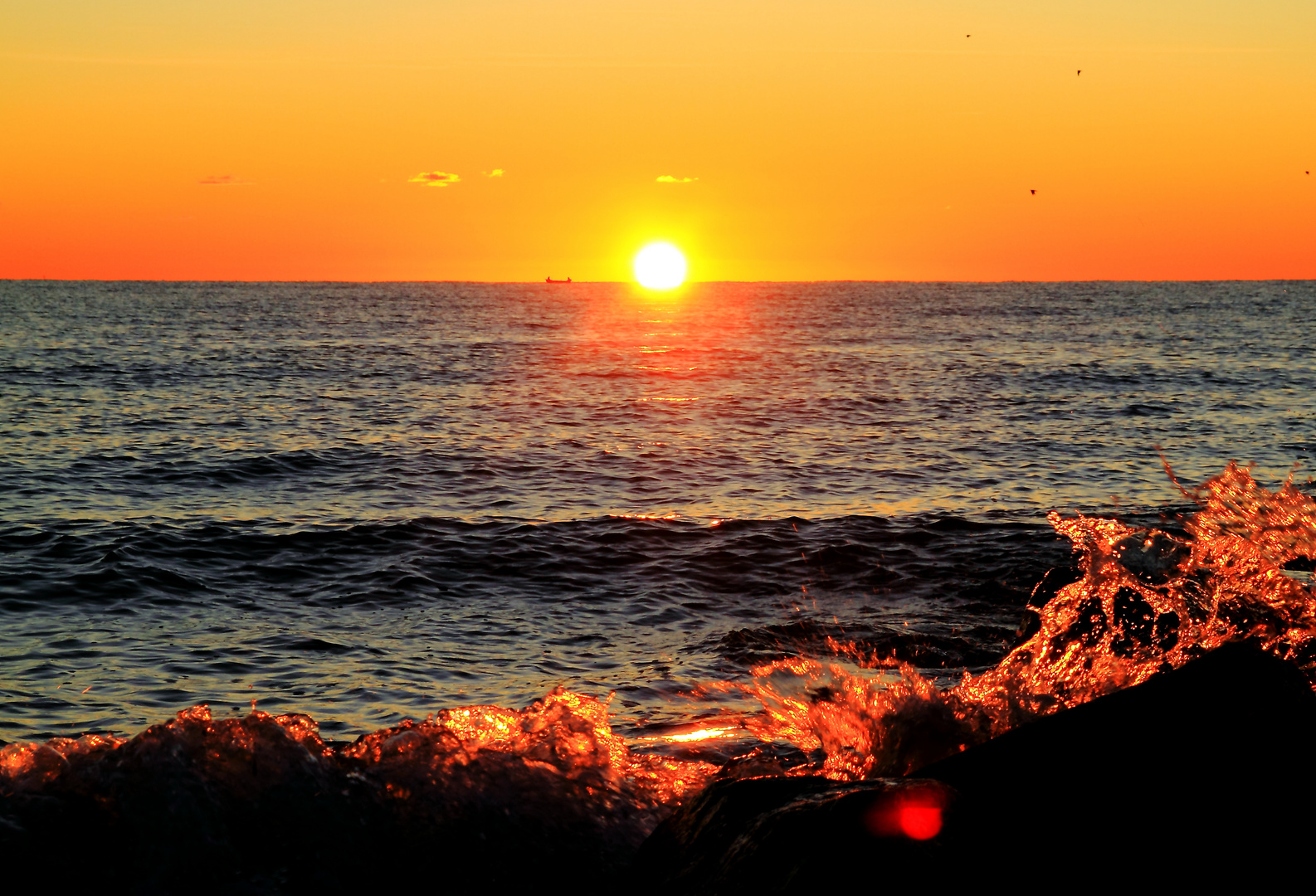 Sonne verlässt Meer