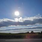 Sonne, Wolken, Wind und Landschaft