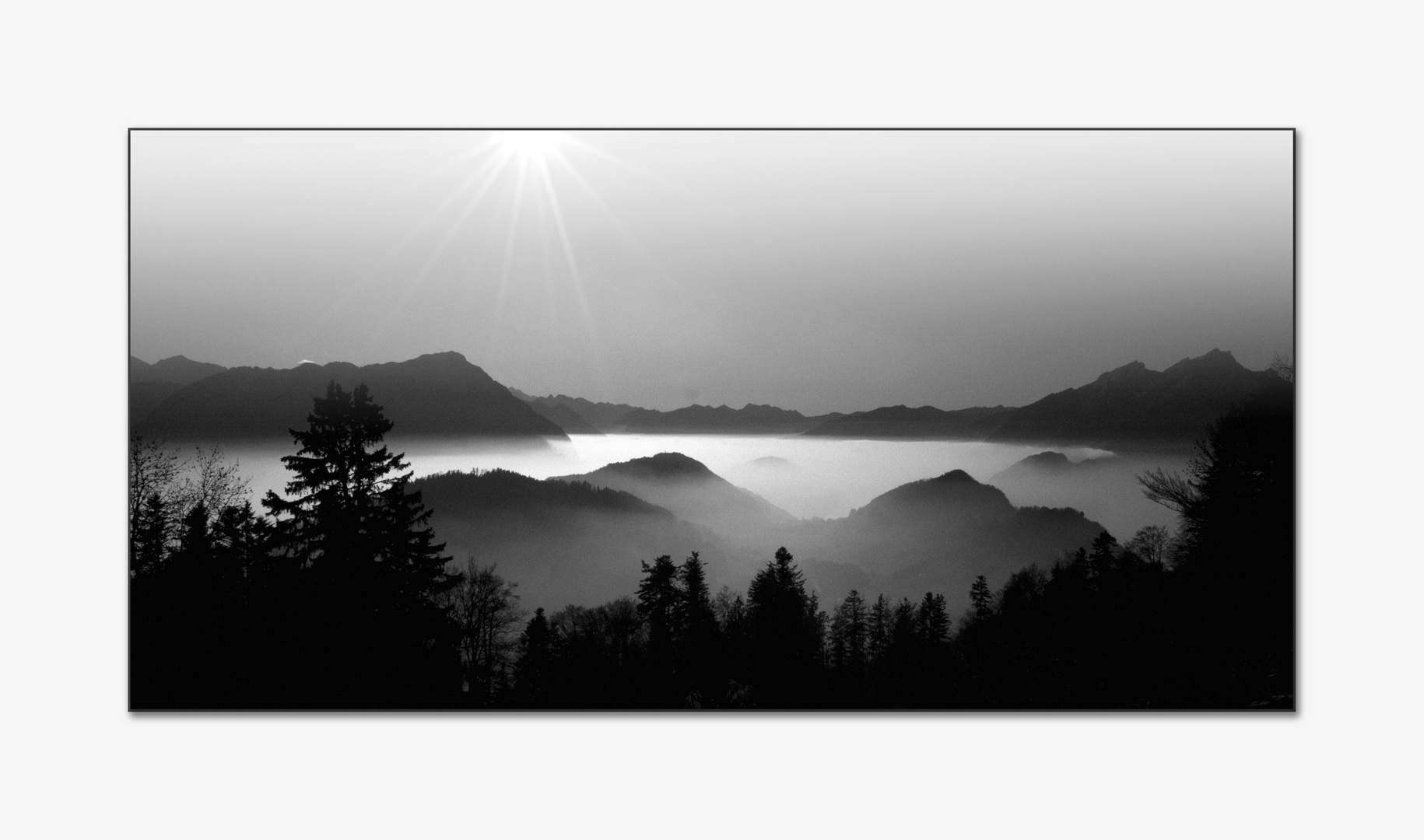 Sonne,Berge und Nebel