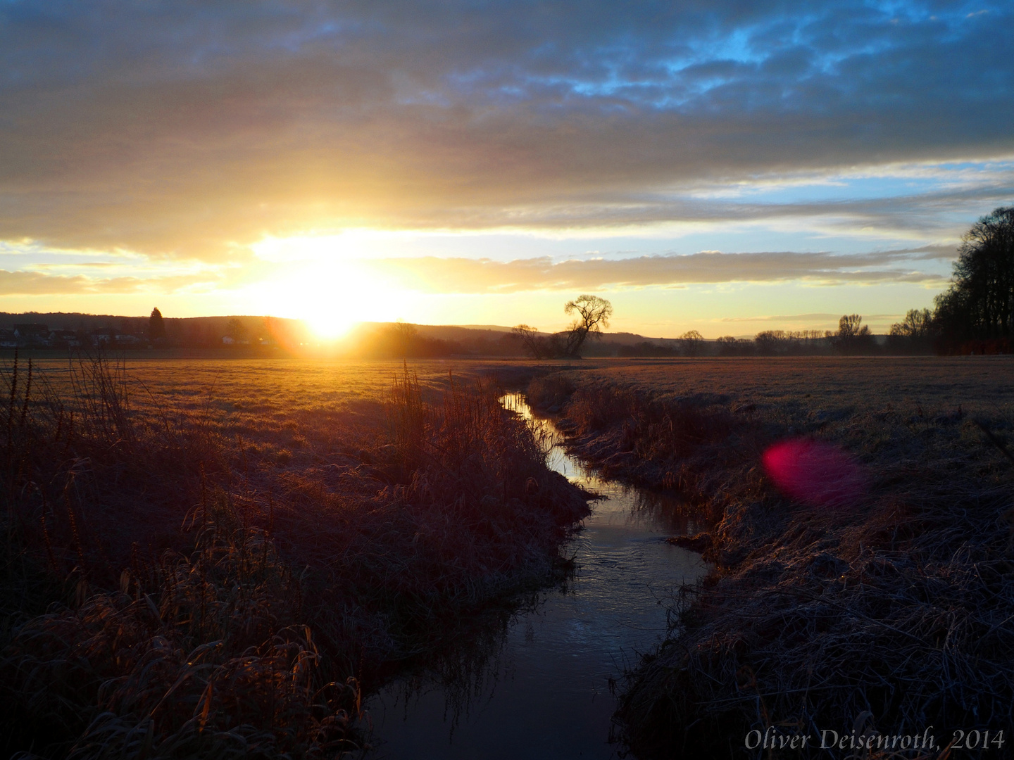 Sonnenaufgang am Bach