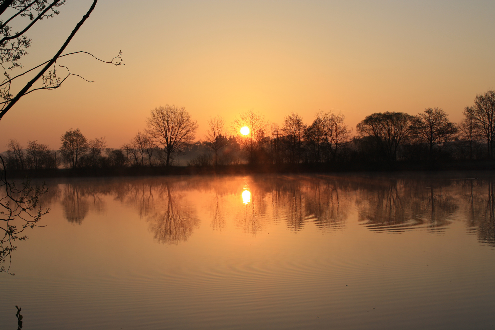 Sonnenaufgang am Baggersee