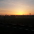 Sonnenaufgang am Bahnhof