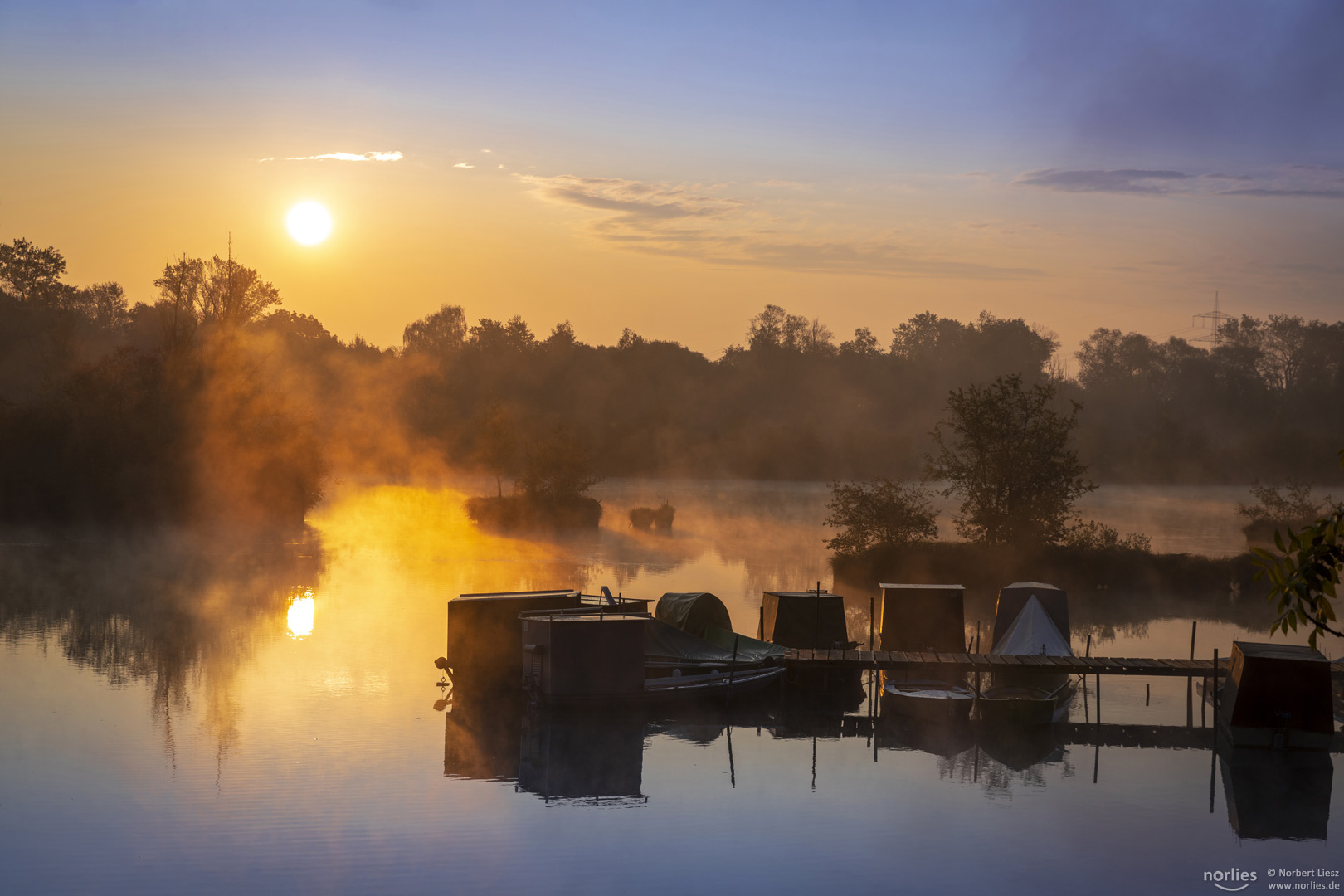 Sonnenaufgang am Bootssteg