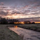 Sonnenaufgang am Fluß