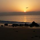 Sonnenaufgang am Meer mit Touribomber