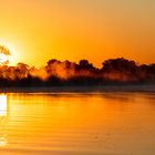 Sonnenaufgang am Okavango