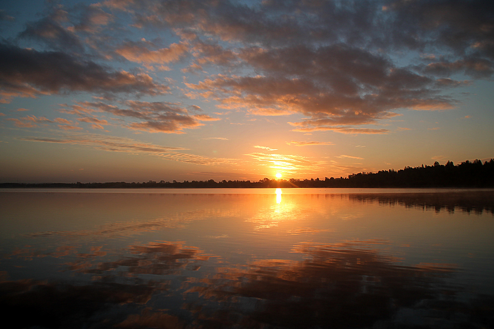 Sonnenaufgang am Schladitzer See
