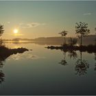 Sonnenaufgang am See Flären bei Flattinge