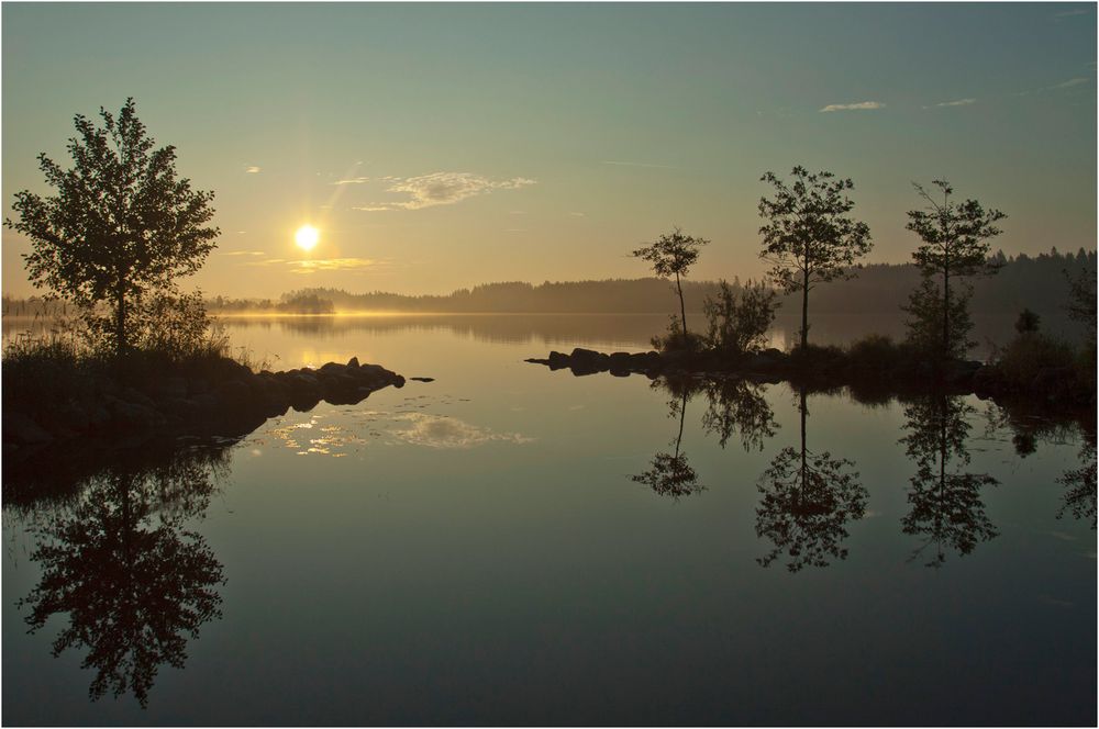 Sonnenaufgang am See Flären bei Flattinge