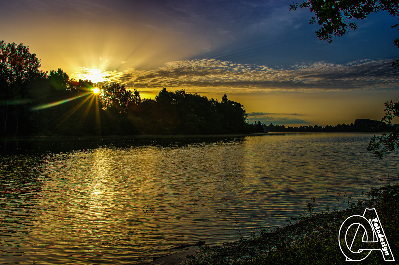 Sonnenaufgang am Stausee Losheim