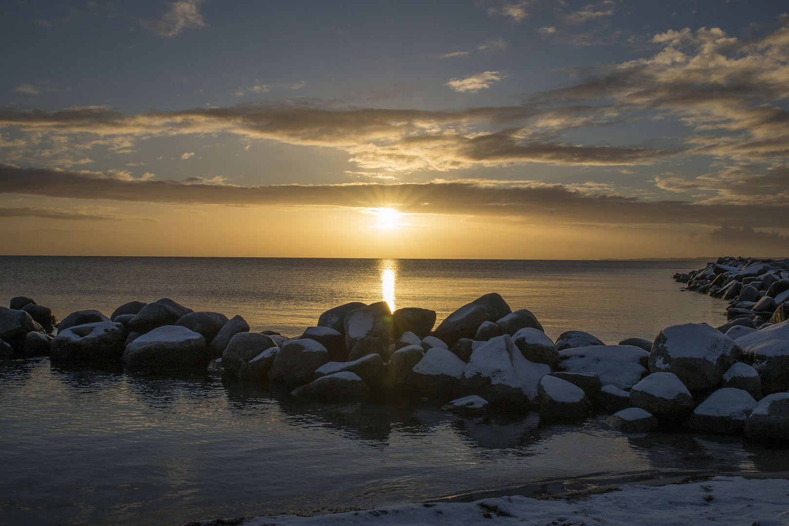 Sonnenaufgang am Strand von Damm