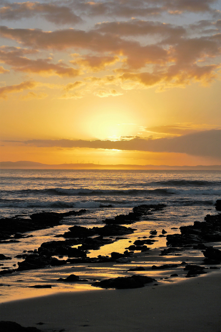 Sonnenaufgang am Strand von Jeffrey's Bay