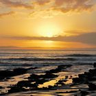 Sonnenaufgang am Strand von Jeffrey's Bay