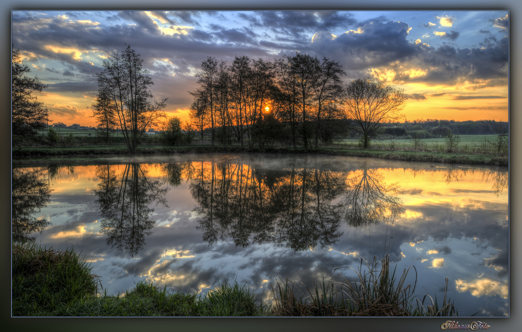 Sonnenaufgang am Teich