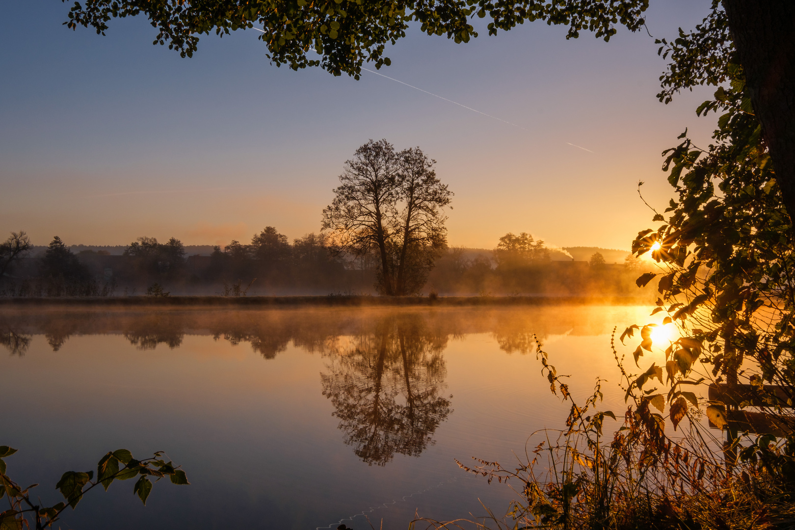 Sonnenaufgang am Weiher