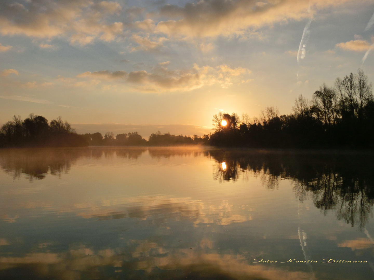 Sonnenaufgang am Weiher