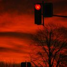Sonnenaufgang an der roten Ampel